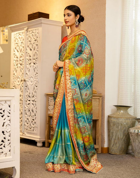 Vasthrlay Bandhani Embroidery Teal Blue And Multi Saree With Unstitched Blouse Piece