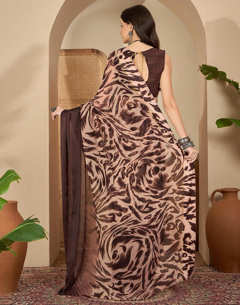 Vasthrlay Printed Georgette Brown Saree With Unstitched Blouse Piece