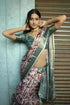 Vasthrlay Maroon Abstract Floral Polyester Saree With Zari Border And Ruched Unstitched Blouse Piece
