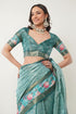 Vasthrlay Turquoise Blue Patchwork Print Polyester Saree With Zari Border And Unstitched Blouse Piece
