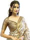 Vasthrlay Bronze Cream Geometric Triangle Print Polyester Saree With Muted Gold Zari Border And Teal Blue Ruched Unstitched Blouse Piece