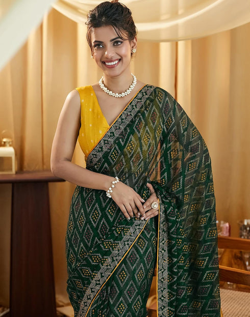 Vasthrlay Georgette Bandhani Dark Green Saree With Yellow Unstitched Blouse Piece
