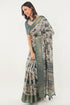 Vasthrlay Off White Teal Patchwork Print Polyester Saree With Zari Border And Unstitched Blouse Piece