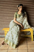 Vasthrlay Sage Green Abstract Print Polyester Saree With Zari Border And Unstitched Blouse Piece