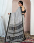 Vasthrlay Bandhani Printed White And Black Saree With Unstitched Blouse Piece