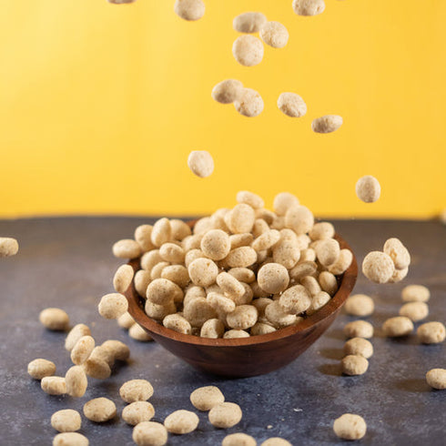 Snackible Cream And Onion Jowar Puffs