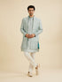 Manyavar Soft Green Grid Patterned Indo Western Set with Floral Motifs