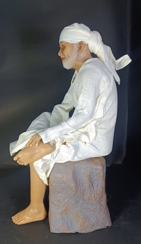 Sai Baba Murthi Sitting On Rock