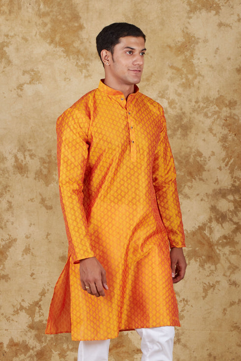 Veshbhoshaa Bluesaanchi Banarsi Silk Orange Kurta Set
