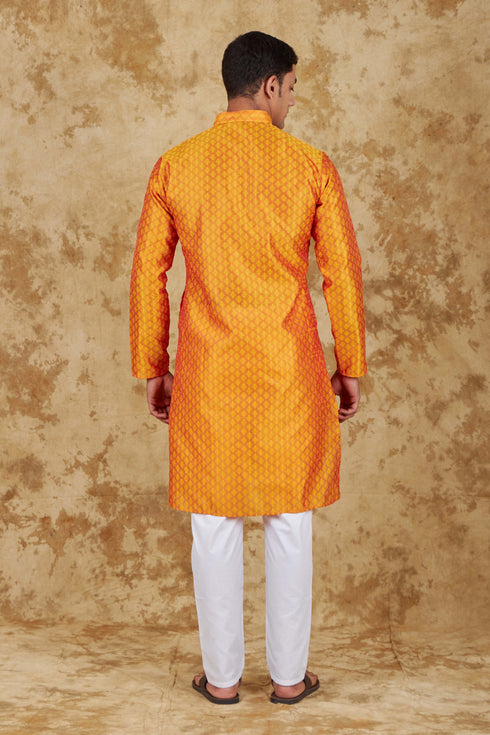 Veshbhoshaa Bluesaanchi Banarsi Silk Orange Kurta Set