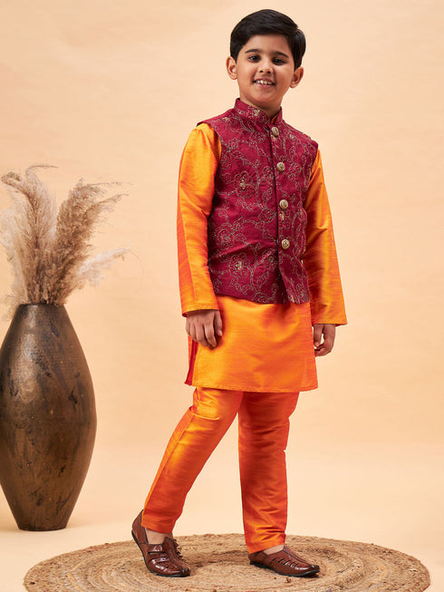 Vastramay Boy's Maroon Nehru Jacket With Orange Kurta And Pyjama Set