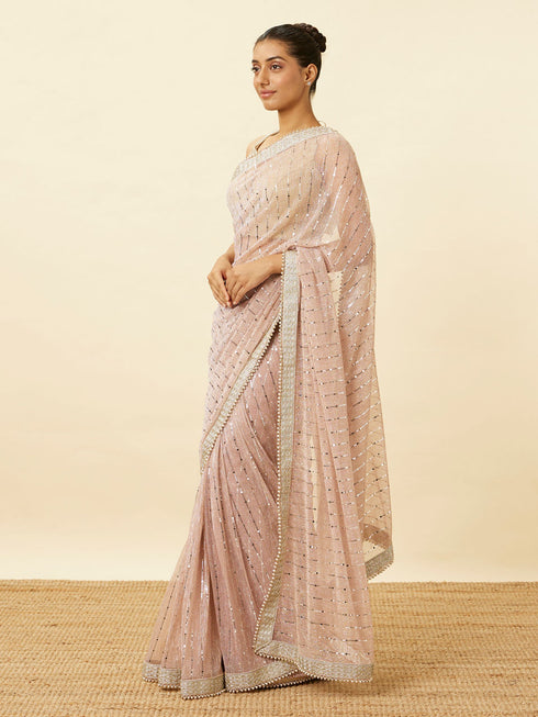 Mohey Lilac Saree with Mirror Work and Ornate Borders