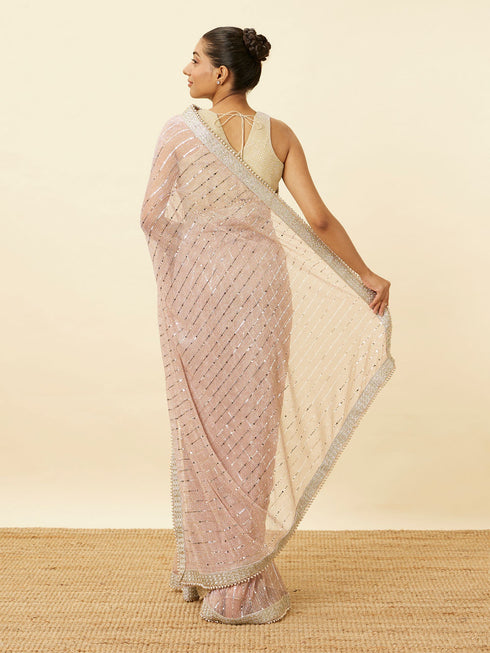 Mohey Lilac Saree with Mirror Work and Ornate Borders