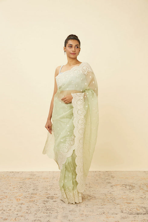 Mohey Pistachio Green Saree with Floral Vine Patterned Borders