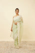 Mohey Pistachio Green Saree with Floral Vine Patterned Borders