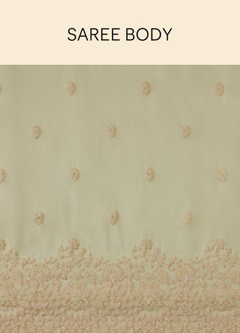 Mohey Pistachio Green Saree with Floral Vine Patterned Borders