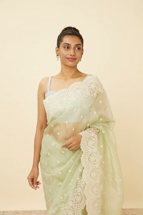 Mohey Pistachio Green Saree with Floral Vine Patterned Borders