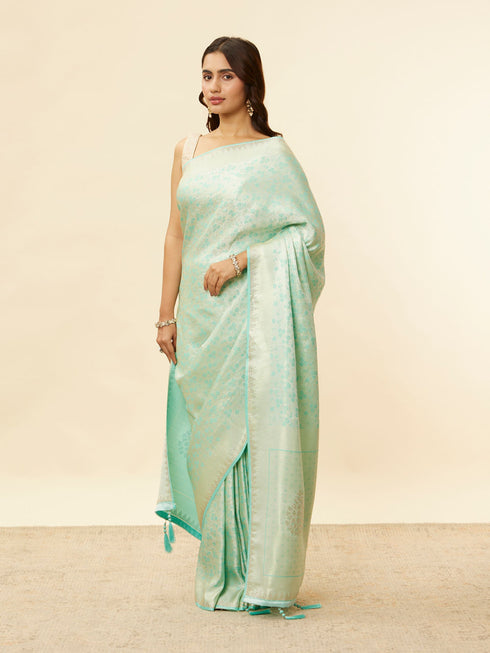 Mohey Tropical Blue Floral Patterned Zari Work Saree