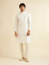 Manyavar Warm White Self Textured Kurta Set with Embroidered Neckline