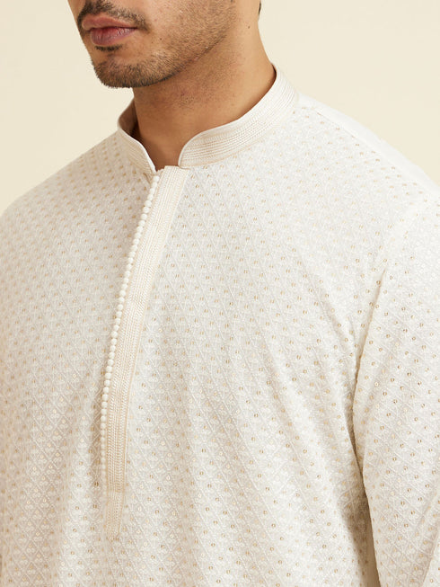 Manyavar Warm White Self Patterned Mirror Work Kurta Set