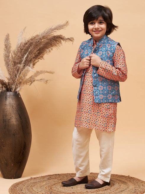 Vastramay Boy's Orange Printed Kurta And Cream Pyjama Set With Blue Nehru Jacket