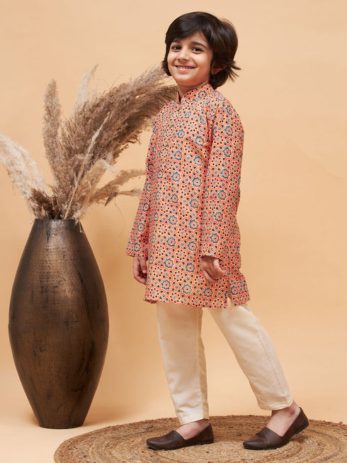 Vastramay Boy's Orange Printed Kurta And Cream Pyjama Set