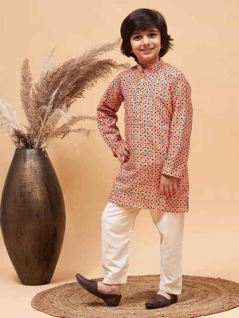 Vastramay Boy's Orange Printed Kurta And Cream Pyjama Set
