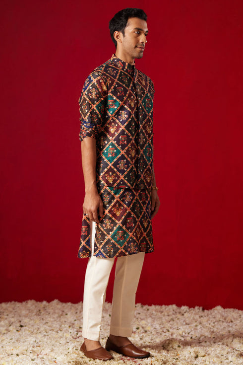 VASTRAMAY Purple Muslin Sequined Patola Printed Navratri Special Kurta Pant Set