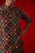 VASTRAMAY Purple Muslin Sequined Patola Printed Navratri Special Kurta Pant Set