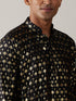 Vastramay Men's Black Foil Printed Kurta With Cream Pant Style Pyjama Set