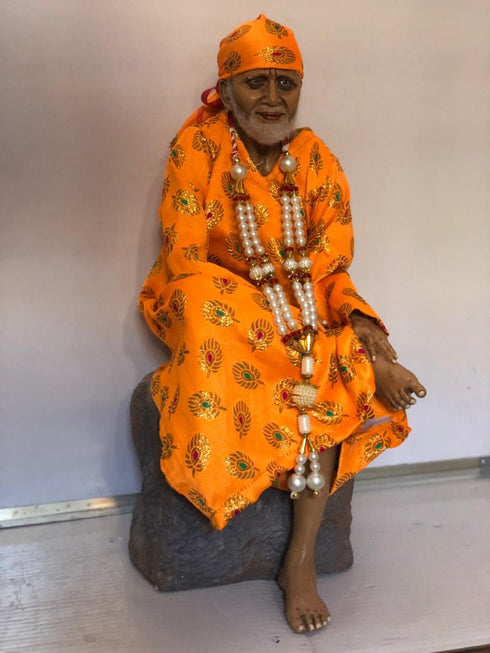 Sai Baba Murthi Sitting On Rock