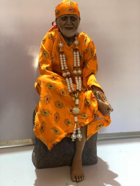 Sai Baba Murthi Sitting On Rock
