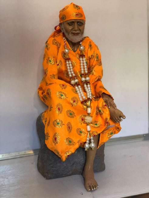 Sai Baba Murthi Sitting On Rock
