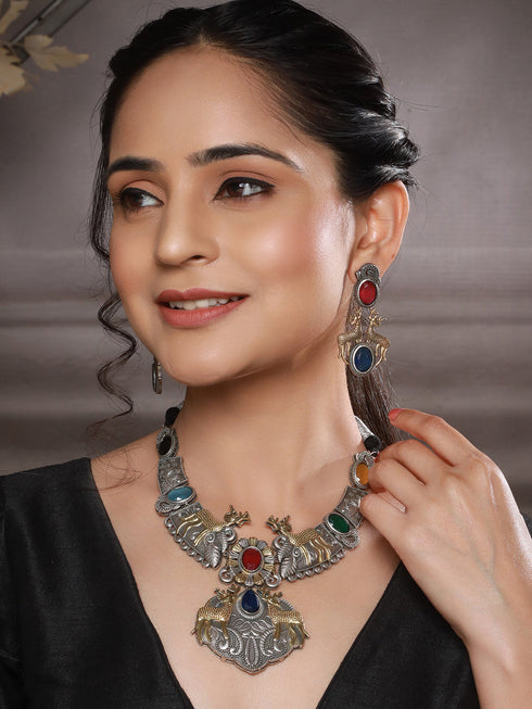 Dual Toned Oxidised Red Stone Studded Brass Handcrafted Deer Motif Intricate Designer Jewellery Set