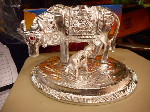 White Metal Cow Set Decorative Showpiece