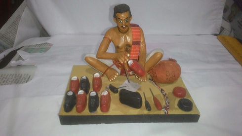 Clay Shoe Maker Show Piece