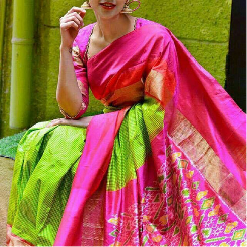Pochampally Ikkat Silk Parrot Green Color Saree With Pink Color Border