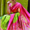 Pochampally Ikkat Silk Parrot Green Color Saree With Pink Color Border