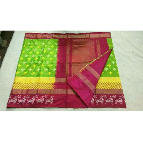 Pochampally Ikkat Silk Parrot Green Color Saree With Rani Pink Color Border