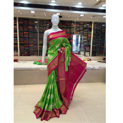 Pochampally Ikkat Silk Parrot Green Color Saree With Pink Color Border T1