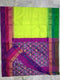 Pochampally Ikkat Silk Parrot Green Color Saree With Purple Color Border