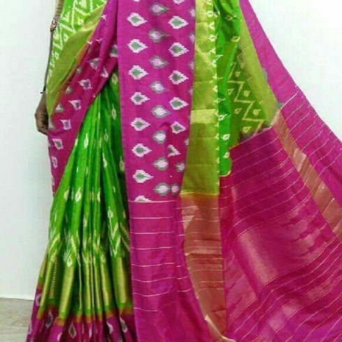 Pochampally Ikkat Silk Parrot Green Color Saree With Pink Border