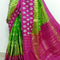 Pochampally Ikkat Silk Parrot Green Color Saree With Pink Border