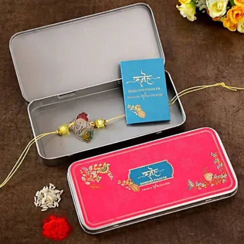 Bal Ganesha Rakhi & Kaju Rolls Box