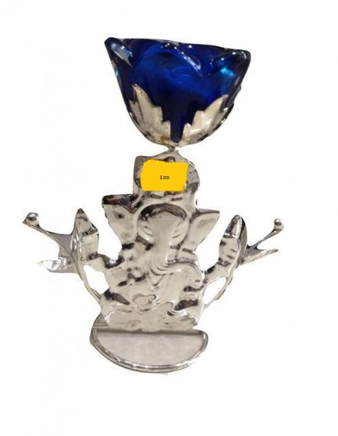 Ganesh With A Candle Stand Made Up Of Metal