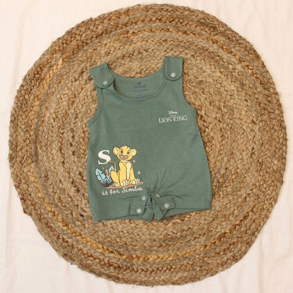 Baby wearing the Simba dungaree and t-shirt set