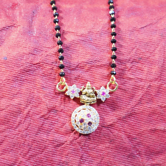 Pure Gold Black Beads With Pink And White Stoned Laxmi Locket Mangalsutra 9.71g