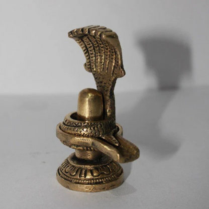 Brass Shivling with Sheshnag 175gm - PUSHMYCART