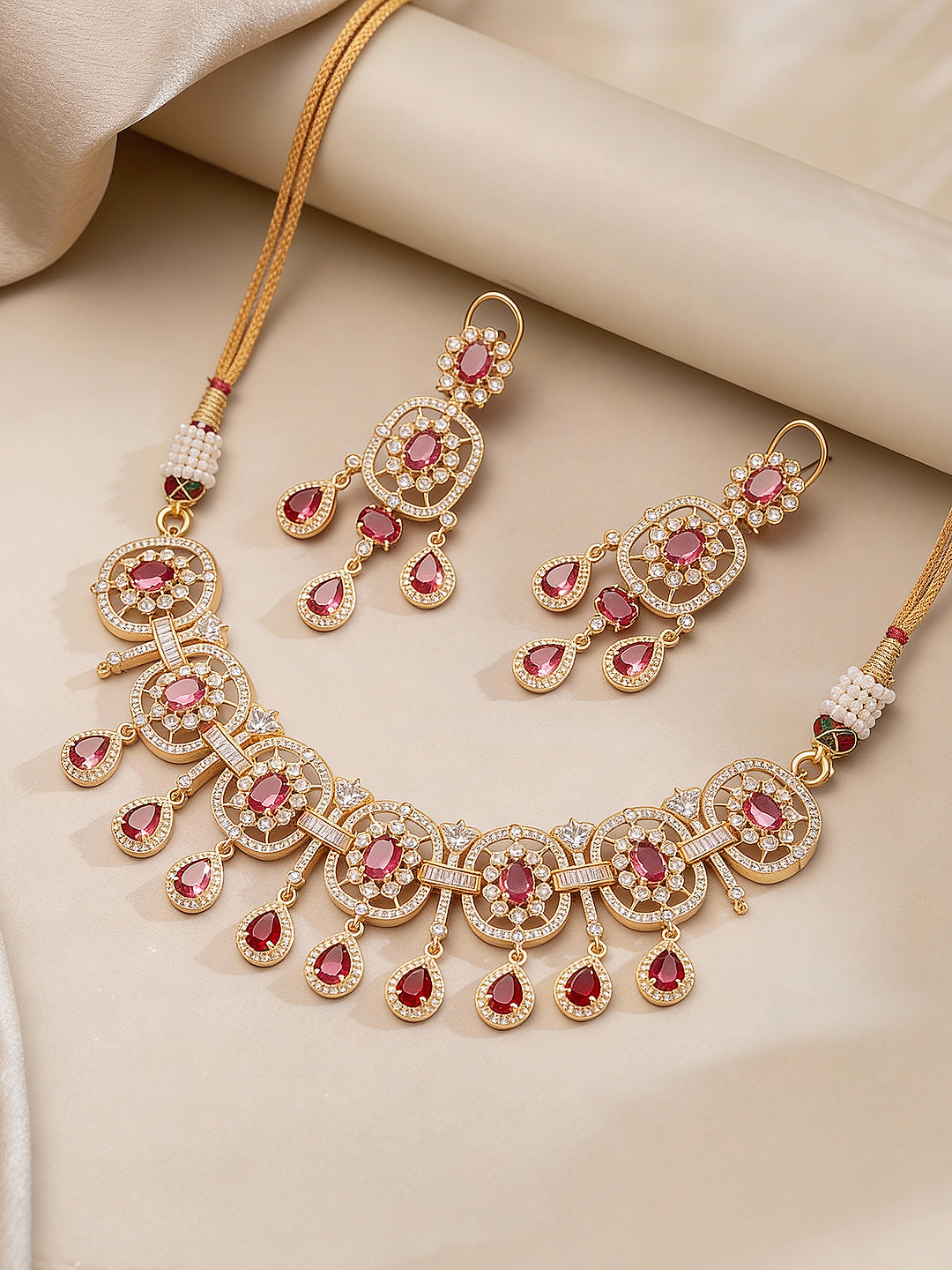 Matching ruby red AD stone earrings