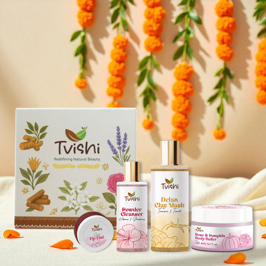 Tvishi Skincare Glowing Skin Gift Set with Detan Clay Mask, Pink Powder Cleanser, Coral Lip Tint, and Body Butter.